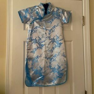 Dress, oriental style in blue satin with extraordinary details.girls.